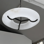 Carve Alabaster Pendant Light – Hand‑Carved Stone Shade with Black Frame by Dalmivik, product or room detail view