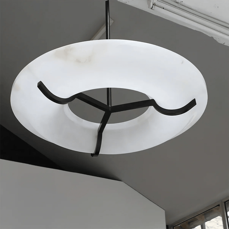 Carve Alabaster Pendant Light – Hand‑Carved Stone Shade with Black Frame by Dalmivik, product or room detail view