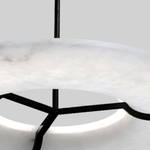 Carve Alabaster Pendant Light – Hand‑Carved Stone Shade with Black Frame by Dalmivik, product or room detail view