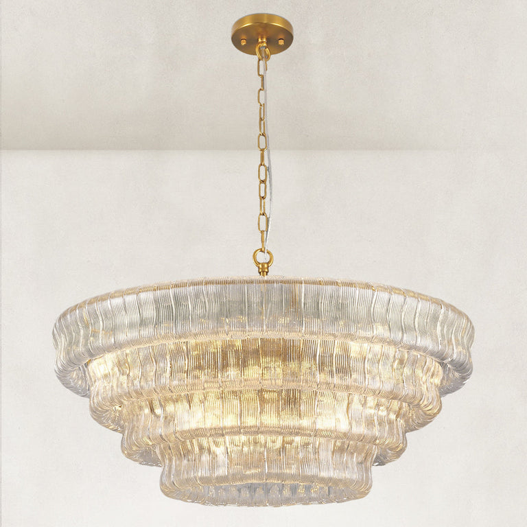 Clear fluted-glass round chandelier with its ceiling canopy.