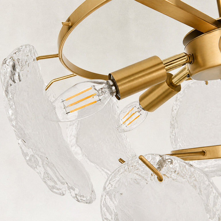 Petal glass chandelier, bulbs, lamp holders and glass-panel clips close view.