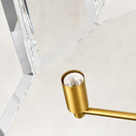 Brass-tone candle-holder and clear crystal attachment detail.