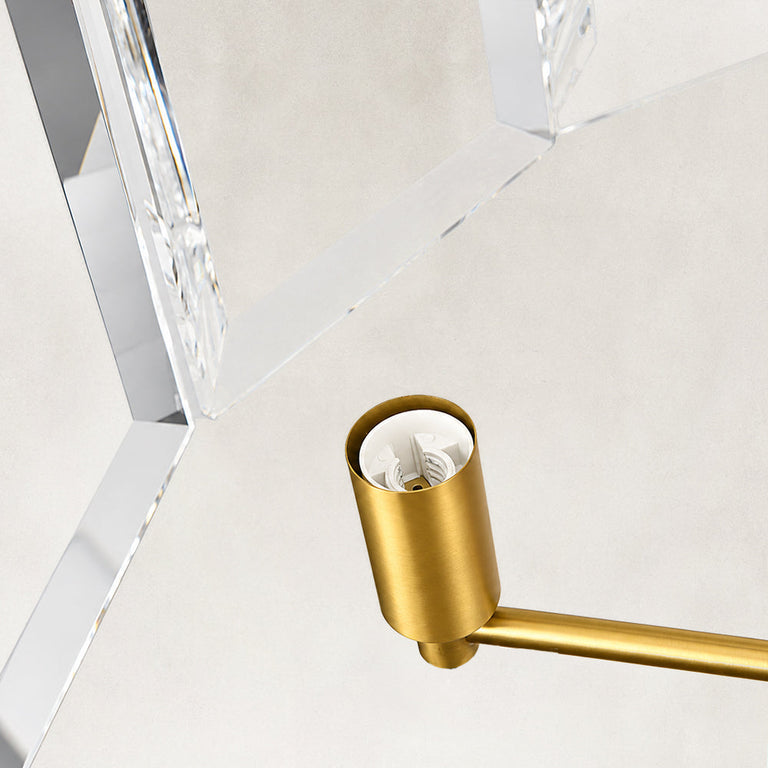 Brass-tone candle-holder and clear crystal attachment detail.