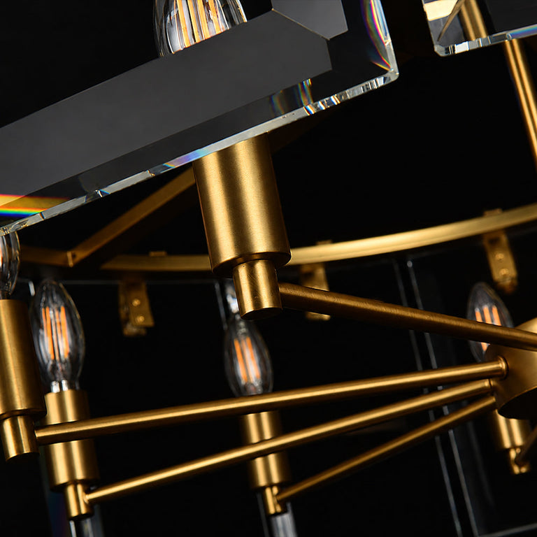 Brass-tone vertical frame and ring connection beside clear crystal bars.