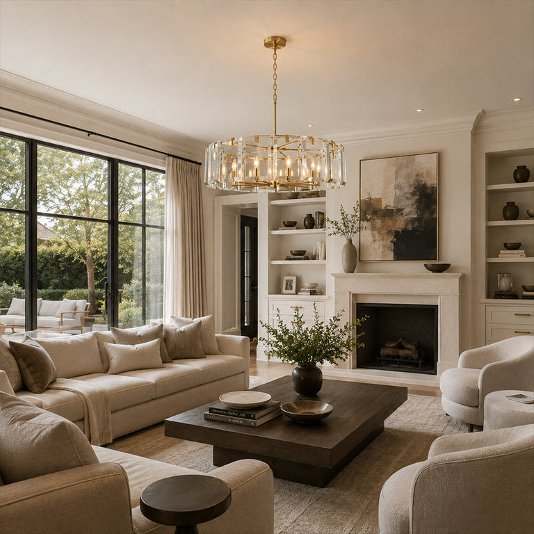 Brass crystal-bar drum chandelier above a warm living room seating area.