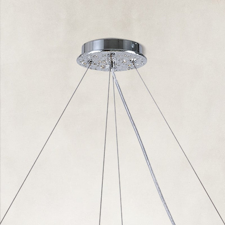 Silver-tone round chandelier canopy and suspension-wire detail.
