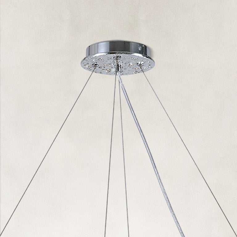 Silver-tone chandelier canopy and suspension cable detail.