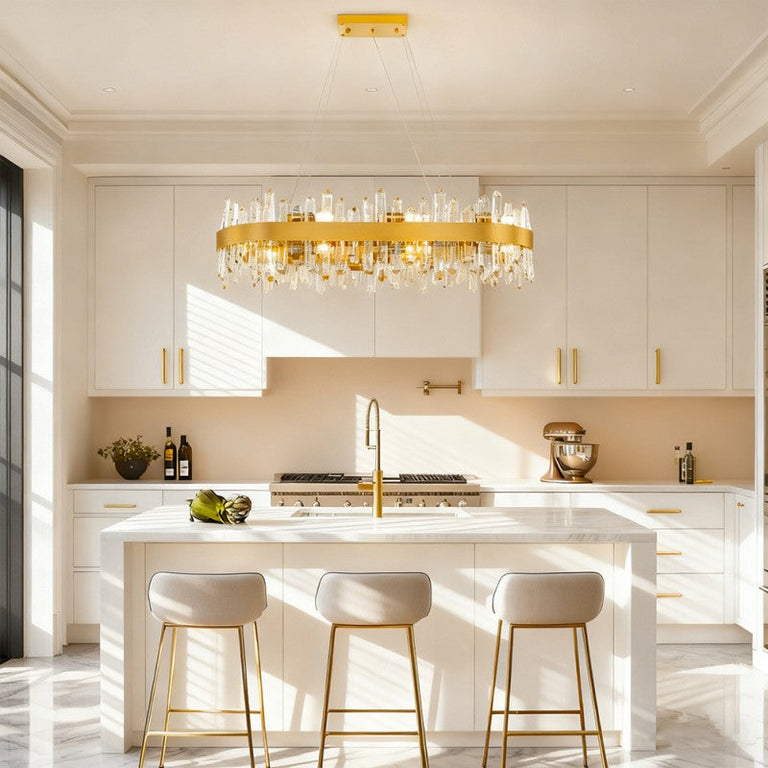 Oval crystal chandelier above a kitchen island.