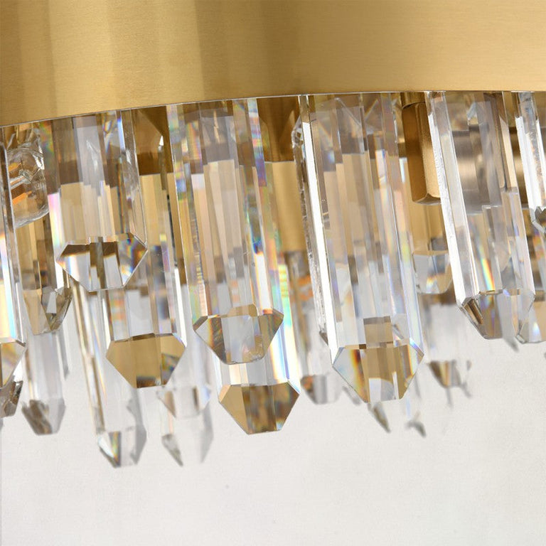 Lower faceted rods beneath the oval chandelier band.