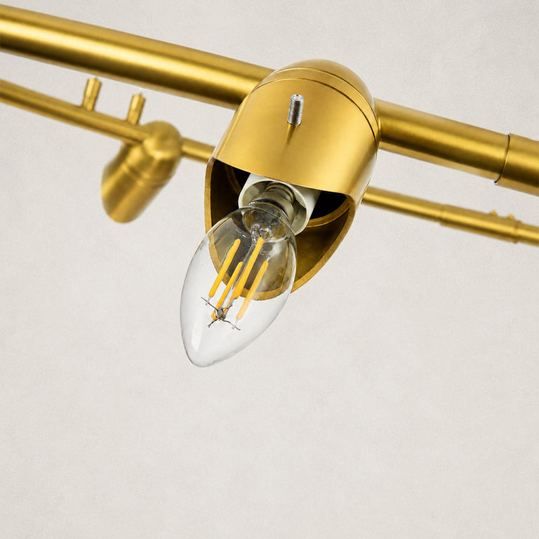 Gold-tone ring chandelier detail.