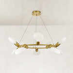 Gold-tone ring chandelier detail.