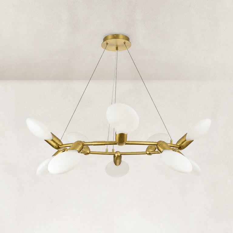 Gold-tone ring chandelier detail.