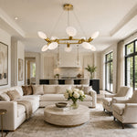 Gold-tone ring chandelier room scene.