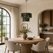 Dark Green Marble Tiered Pendant installed above a dining table