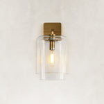 Double-Layer Clear Glass Wall Sconce in Aged Brass, complete fixture close view