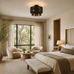 Black two-tier woven fixture in a bedroom setting.