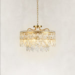 Illuminated faceted crystal drum chandelier showing layered crystal detail