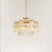 Illuminated faceted crystal drum chandelier showing layered crystal detail