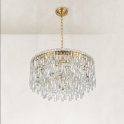 Unlit three-quarter view of the faceted crystal drum chandelier