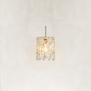Illuminated faceted crystal mini pendant viewed from the front