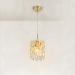 Three-quarter view of the faceted crystal mini pendant and brushed gold frame