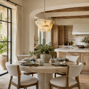 Faceted Ivory Marble Pendant installed above a dining table