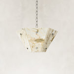 Product detail of Faceted Ivory Marble Pendant against a neutral background