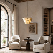 Faceted Ivory Marble Pendant displayed in a furnished interior