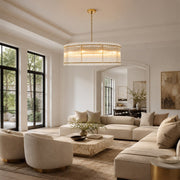 Fluted Glass Rod Drum Chandelier in Aged Brass - interior setting