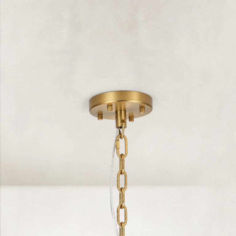 Round gold-tone chandelier canopy and chain.