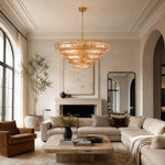 Fluted Glass Tiered Round Chandelier, 48 in in amber finish, shown in a living room