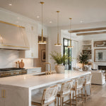 Gilded Marble Disc Pendant installed above a kitchen island