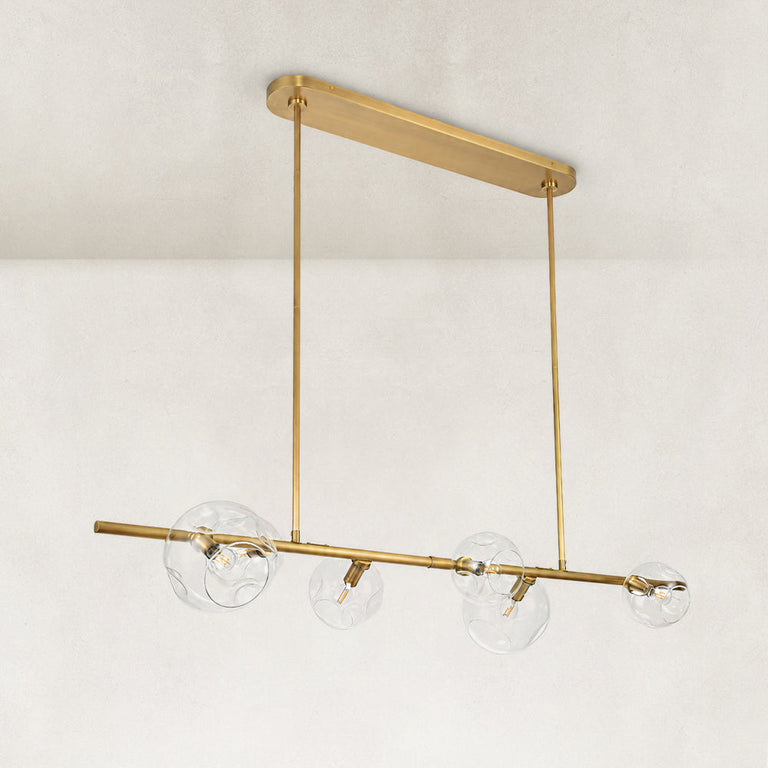 Gold-tone bubble glass linear chandelier complete fixture angled view