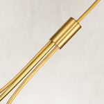 Gold-tone chandelier central sleeve and rod bundle close view