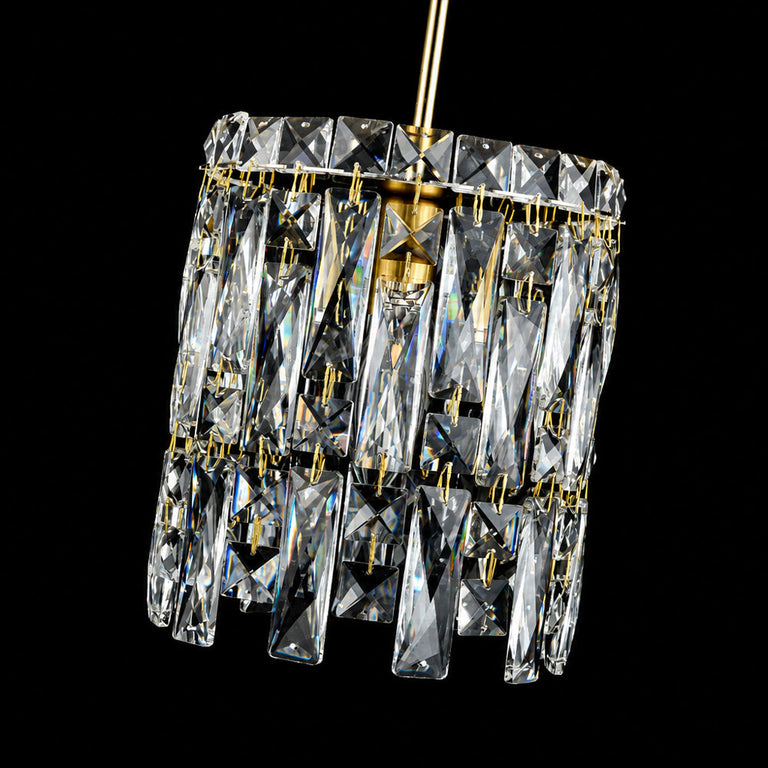 Gold-tone crystal pendant light, crystal shade on dark background