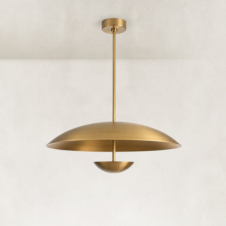 Gold-tone disc pendant complete fixture against a neutral background