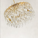 Gold-tone tiered crystal chandelier, angled crystal curtain close view