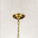 Gold-tone tiered crystal chandelier, canopy and chain close view