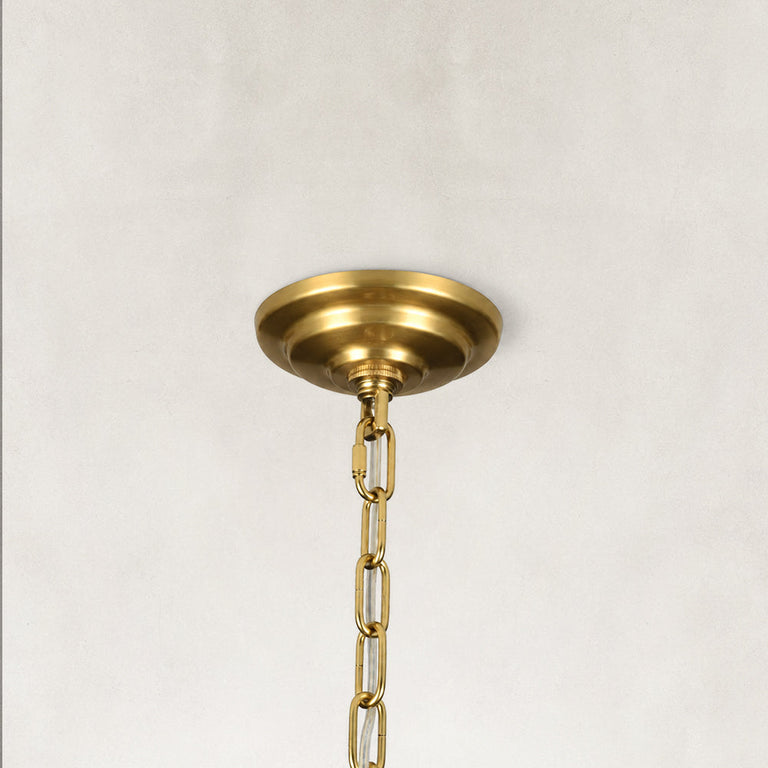 Gold-tone tiered crystal chandelier, canopy and chain close view