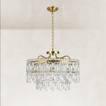 Gold-tone tiered crystal chandelier, complete fixture unlit frontal fixture