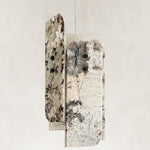 Product detail of Graphic Four-Panel Marble Pendant against a neutral background