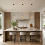 Graphic Vein Four-Panel Marble Pendant installed above a kitchen island