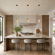 Graphic Vein Four-Panel Marble Pendant installed above a kitchen island