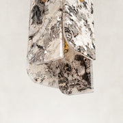 Product detail of Graphic Vein Four-Panel Marble Pendant against a neutral background