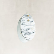 Product detail of Graphic Vein Marble Disc Pendant against a neutral background
