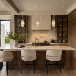 Graphic Vein Marble Disc Pendant installed above a kitchen island
