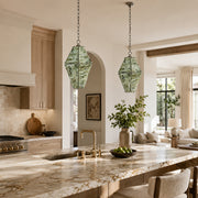 Green Faceted Marble Lantern Pendant displayed in a furnished interior