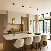 Green Four-Panel Marble Pendant displayed in a furnished interior