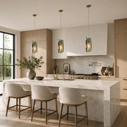 Green Four-Panel Marble Pendant displayed in a furnished interior