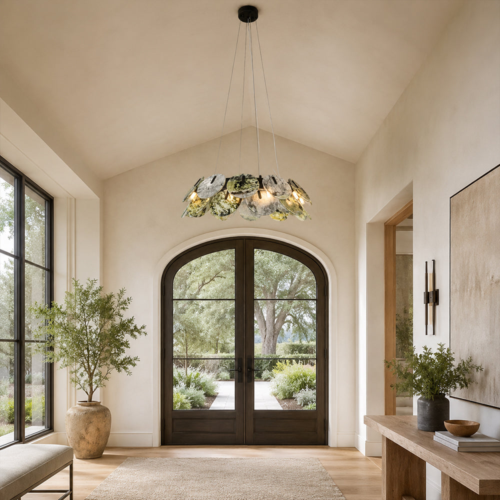 Green marble disc ring chandelier in an entryway
